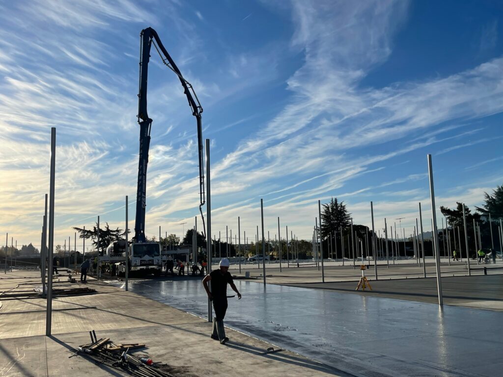 Concrete crew pouring a new driveway slab, Bay Area