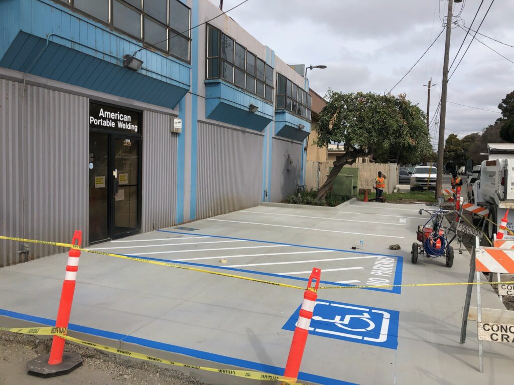 DA-compliant accessible parking space with striping at a commercial property, South Bay Area