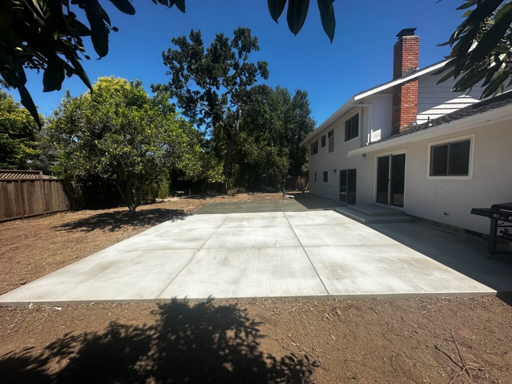 Residential backyard concrete patio installation, South Bay Area