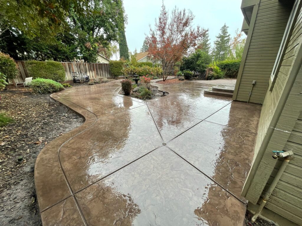 Stamped concrete patio with gray ashlar slate pattern, San Jose CA
